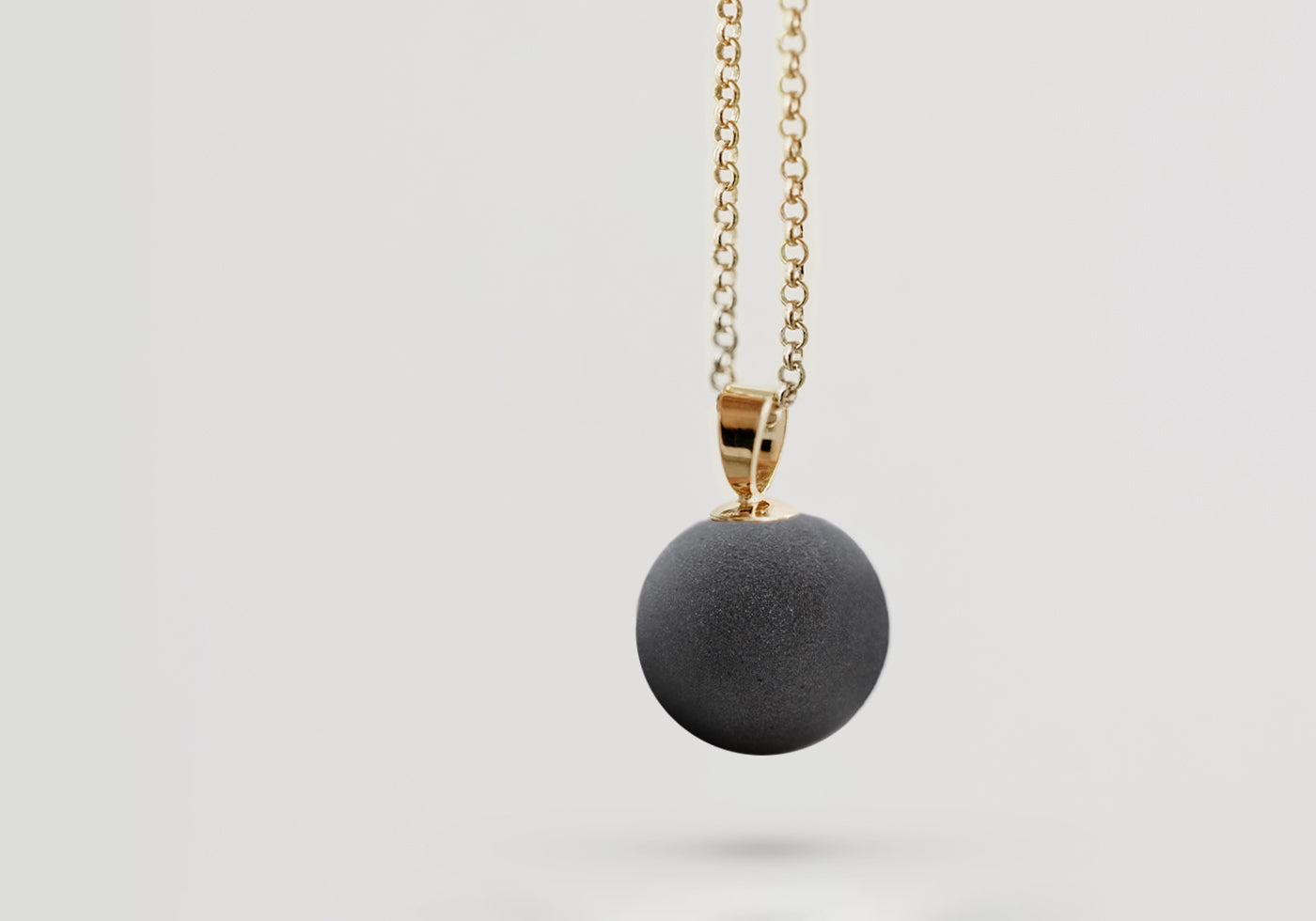 Perle mit Seele - BLACK VULCANO gold